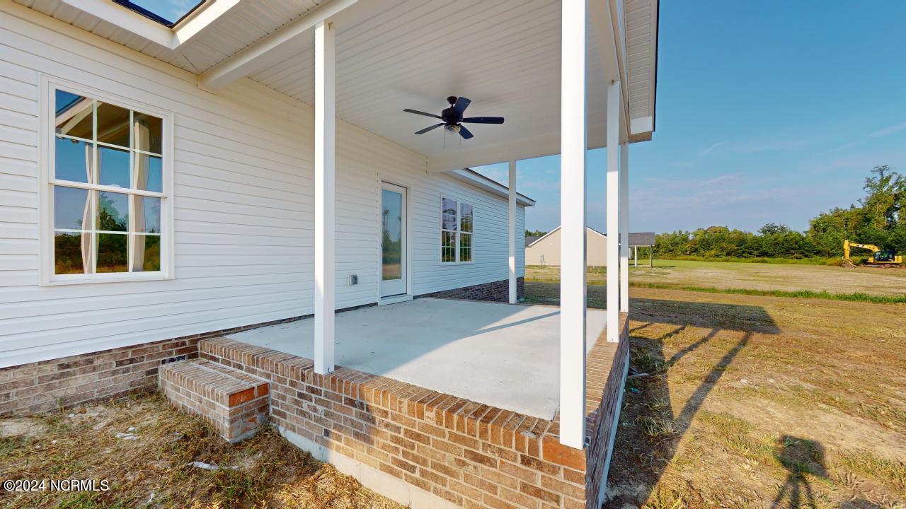 1483 Lancaster Road Pikeville, NC 27863 - Photo 38 of 40 Rear Covered Patio