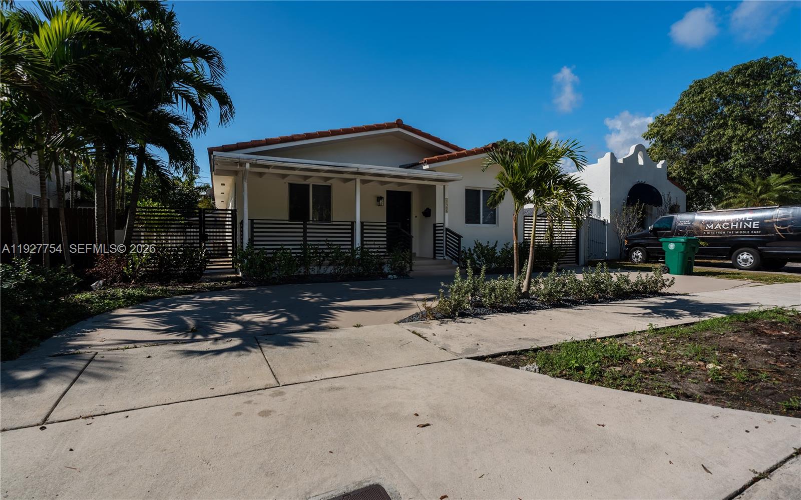 426 Southwest 26th Road Miami, FL 33129 - Photo 2 of 12 a front view of a house with garden