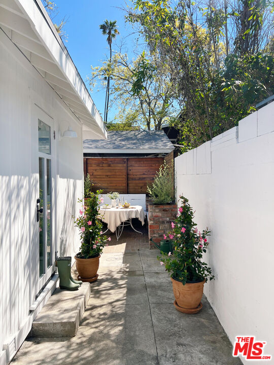 6506 Ruby Street Los Angeles, CA 90042 - Photo 19 of 21 a view of a porch with furniture