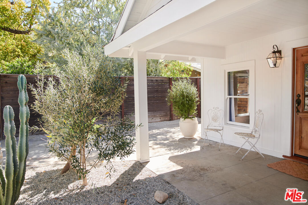 6506 Ruby Street Los Angeles, CA 90042 - Photo 2 of 21 a view of a house with a yard