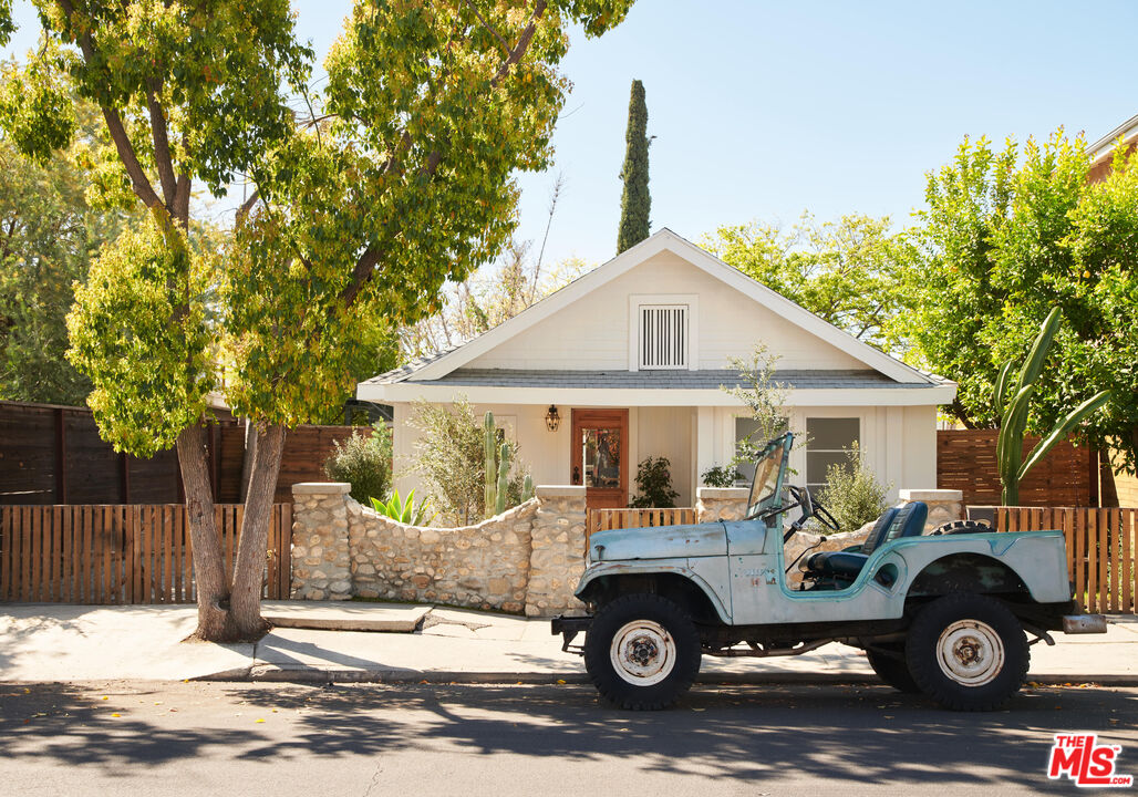 6506 Ruby Street Los Angeles, CA 90042 - Photo 21 of 21 a car parked in front of a house
