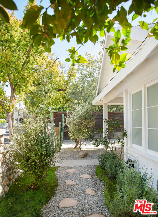 6506 Ruby Street Los Angeles, CA 90042 - Photo 3 of 21 a view of a house with a tree