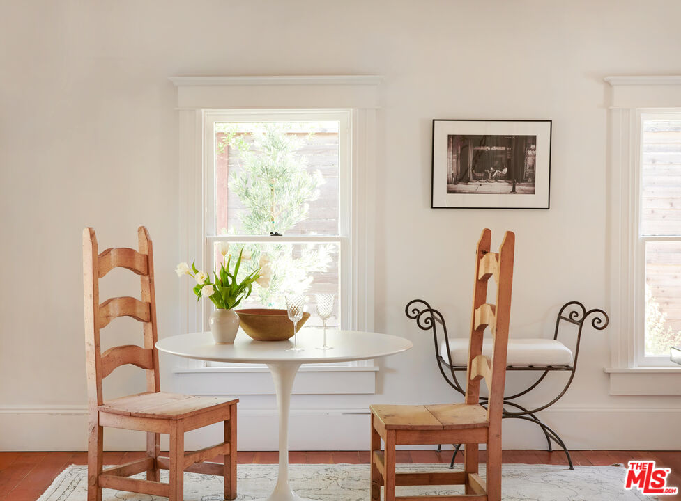 6506 Ruby Street Los Angeles, CA 90042 - Photo 6 of 21 a view of a dining room with furniture and a window