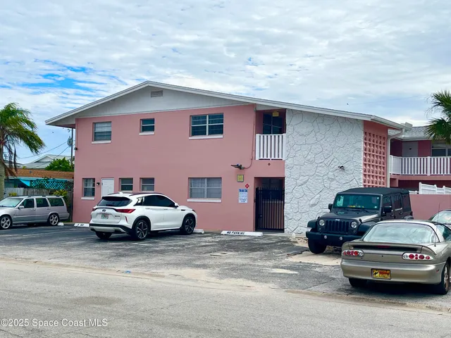 a car parked in front of a house
