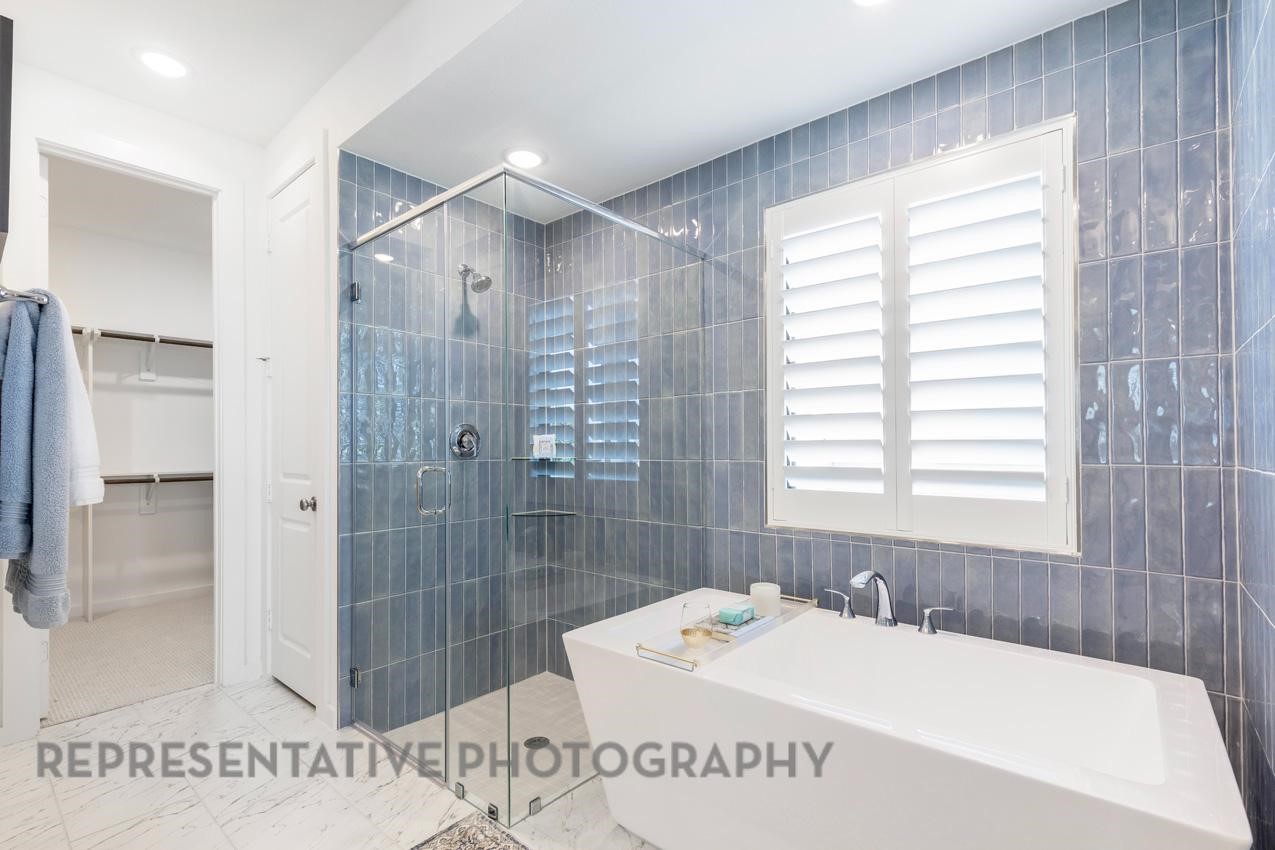 2538 Mission Heights Way Manvel, TX 77578 - Photo 12 of 24 a bathroom with a tub sink and shower