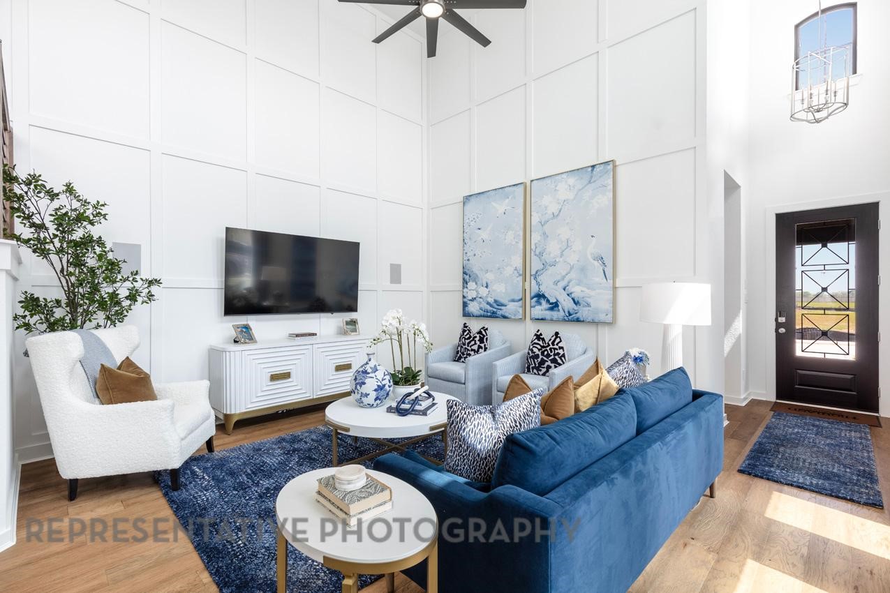 2538 Mission Heights Way Manvel, TX 77578 - Photo 5 of 24 a living room with furniture and a flat screen tv