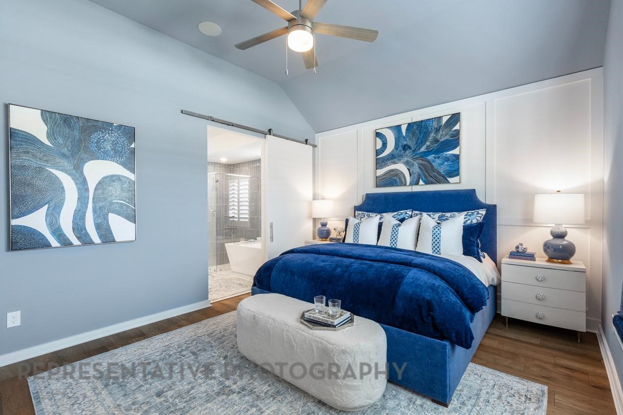 2538 Mission Heights Way Manvel, TX 77578 - Photo 10 of 24 a bedroom with a bed and wooden floor