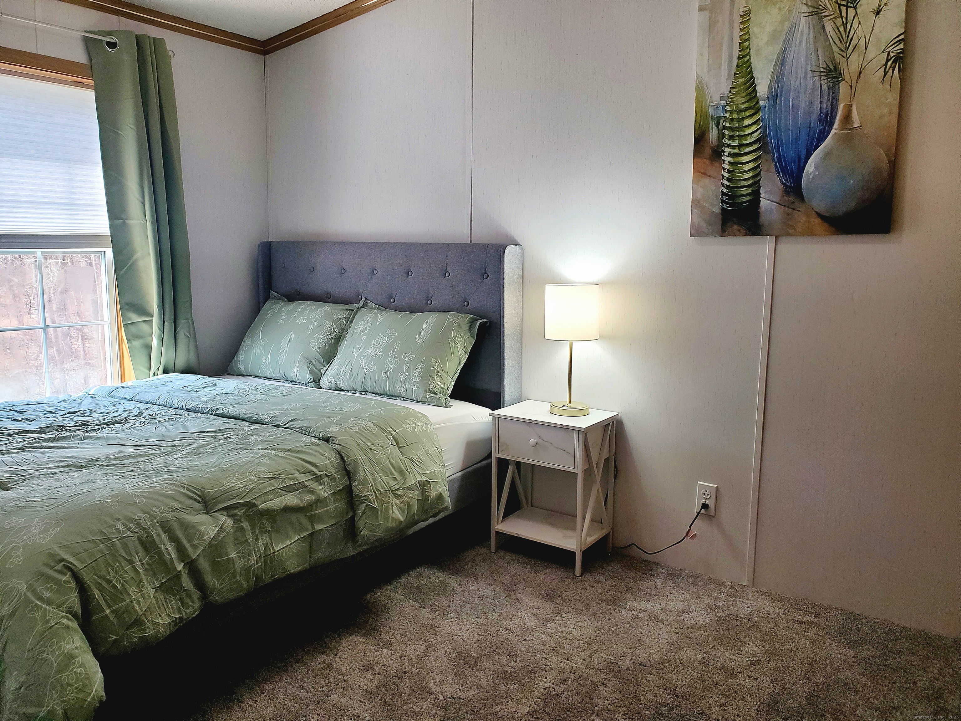 5 Mount Laurel Road Norwich, CT 06360 - Photo 6 of 15 a bedroom with a bed and window