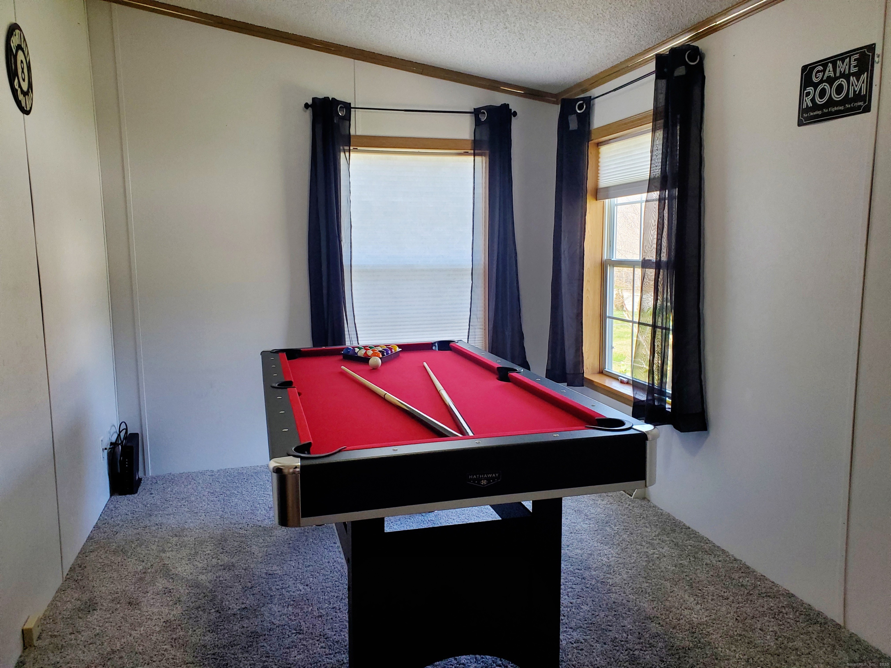 5 Mount Laurel Road Norwich, CT 06360 - Photo 8 of 15 a room with pool table and windows
