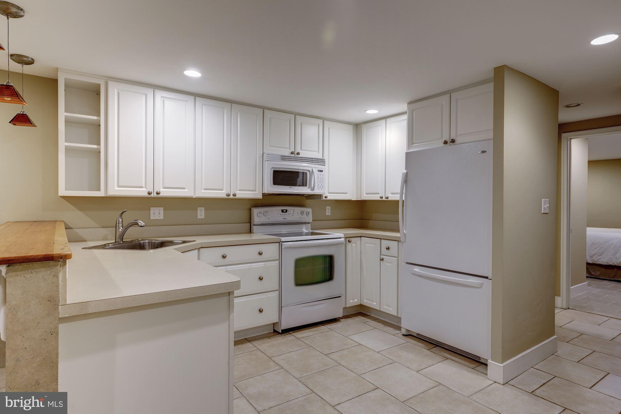 243 8th Street Northeast Washington, DC 20002 - Photo 17 of 29 English basement kitchen