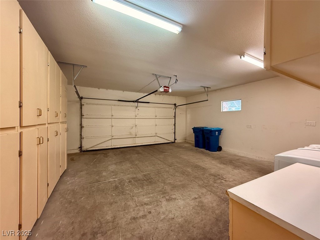 4969 Jeremy Drive Las Vegas, NV 89113 - Photo 68 of 73 Garage featuring washer and clothes dryer