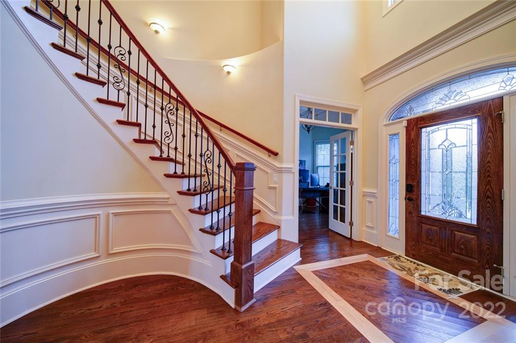 174 Birdie Drive Stanley, NC 28164 - Photo 14 of 46 a view of entryway and hall with wooden floor