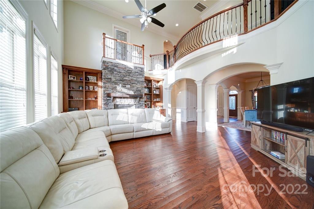 174 Birdie Drive Stanley, NC 28164 - Photo 15 of 46 a living room with furniture and a flat screen tv