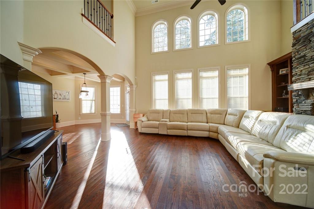 174 Birdie Drive Stanley, NC 28164 - Photo 16 of 46 a living room with furniture and a flat screen tv