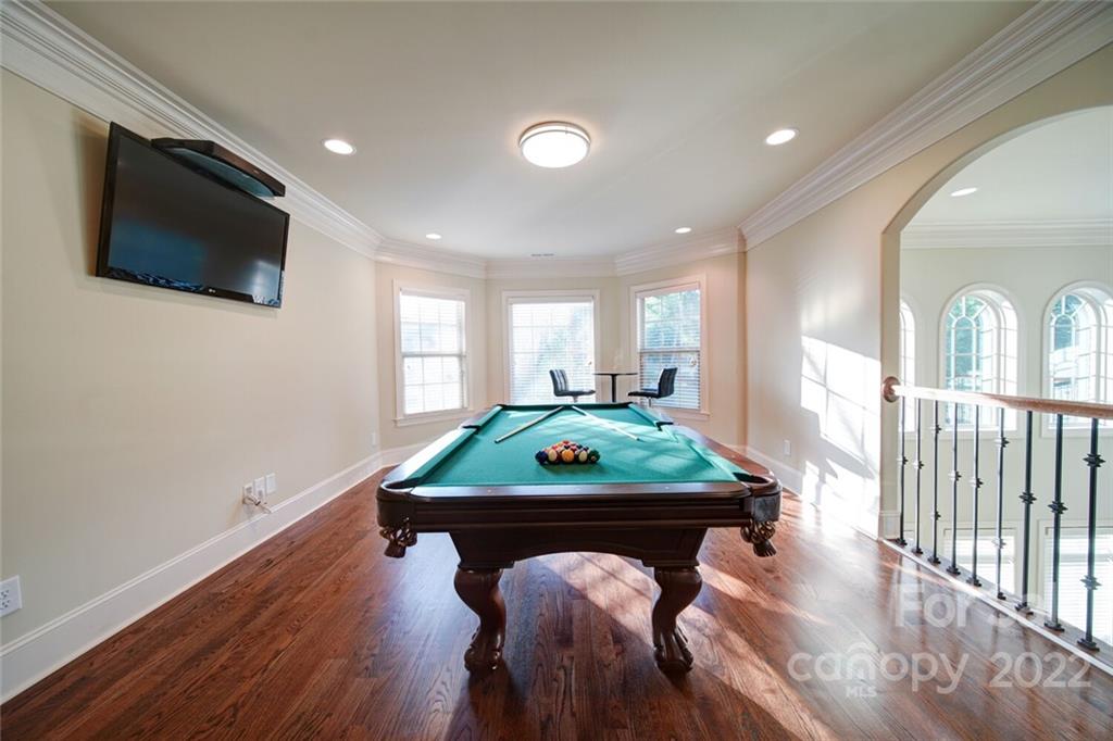 174 Birdie Drive Stanley, NC 28164 - Photo 34 of 46 a living room with furniture and a flat screen tv