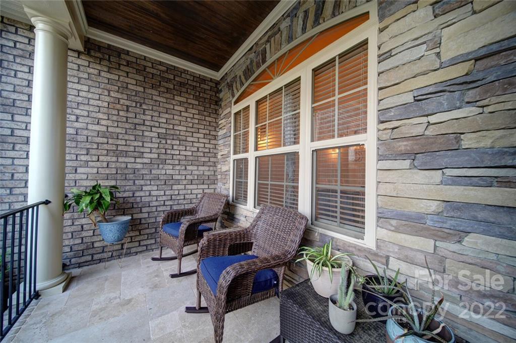 174 Birdie Drive Stanley, NC 28164 - Photo 40 of 46 a view of a chair and table in the balcony