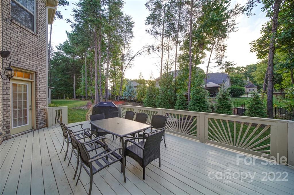 174 Birdie Drive Stanley, NC 28164 - Photo 43 of 46 a view of a deck with furniture and wooden deck