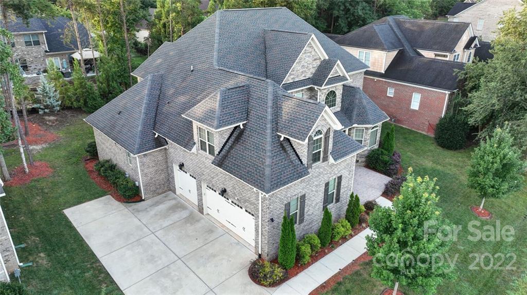 174 Birdie Drive Stanley, NC 28164 - Photo 44 of 46 an aerial view of a house with a yard