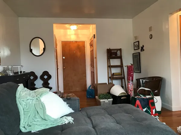 a bed room with a bed and a window