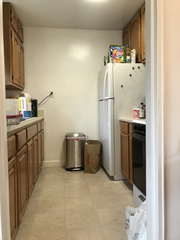 76 Euston Road, Unit 10 Boston, MA 02135 - Photo 6 of 11 a room with storage and utility