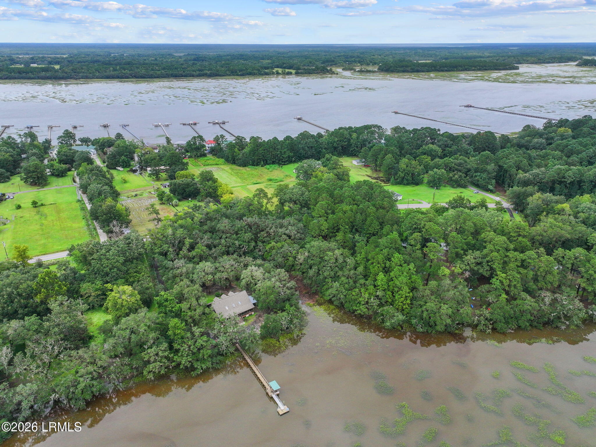 112 Stuart Point Road Seabrook, SC 29940 - Photo 2 of 17 10-web-or-mls-DJI_20250823105538_0152_D
