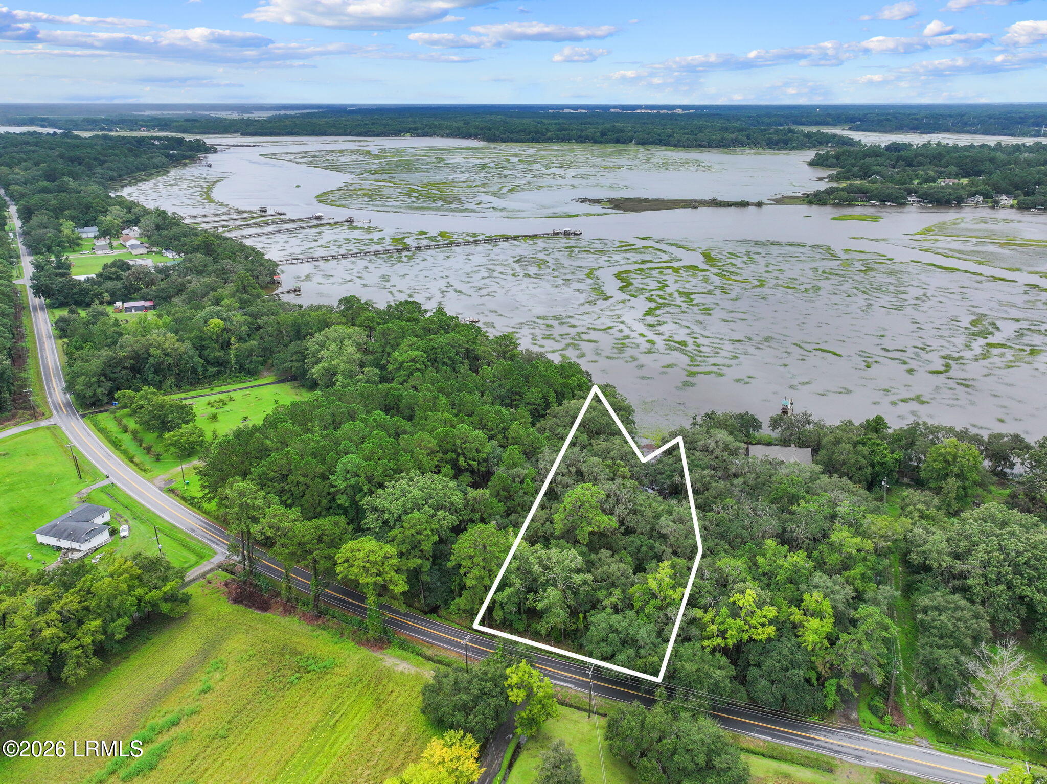 112 Stuart Point Road Seabrook, SC 29940 - Photo 6 of 17 23-web-or-mls-DJI_20250823105427_0147_D
