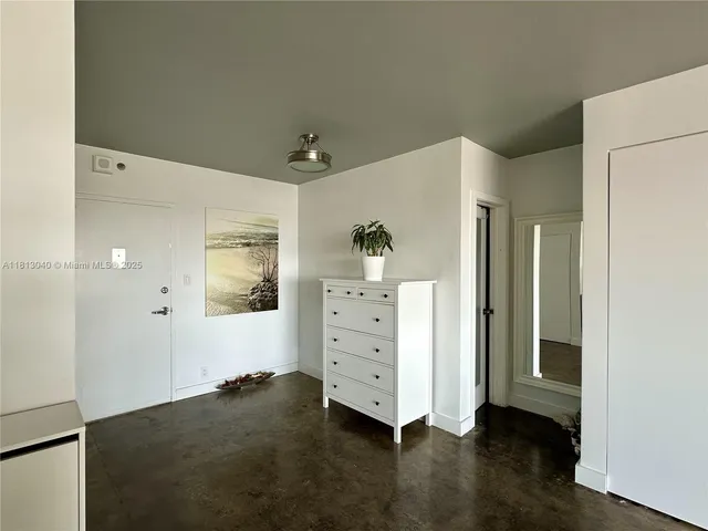a view of a storage & utility room with a sink