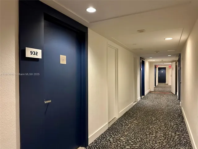 a swimming pool with outdoor seating and yard