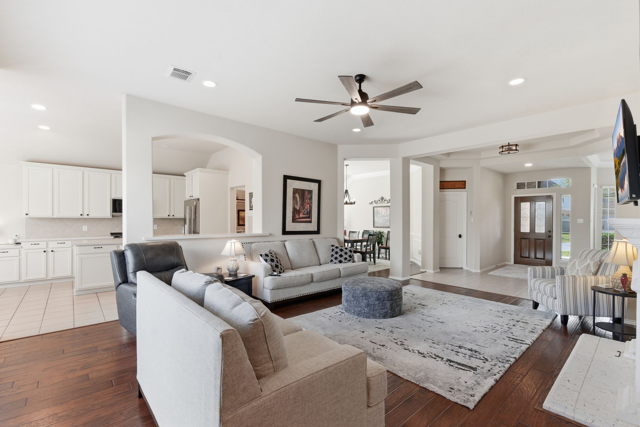 29814 Legends Pass Lane Spring, TX 77386 - Photo 16 of 46 a living room with furniture and a wooden floor