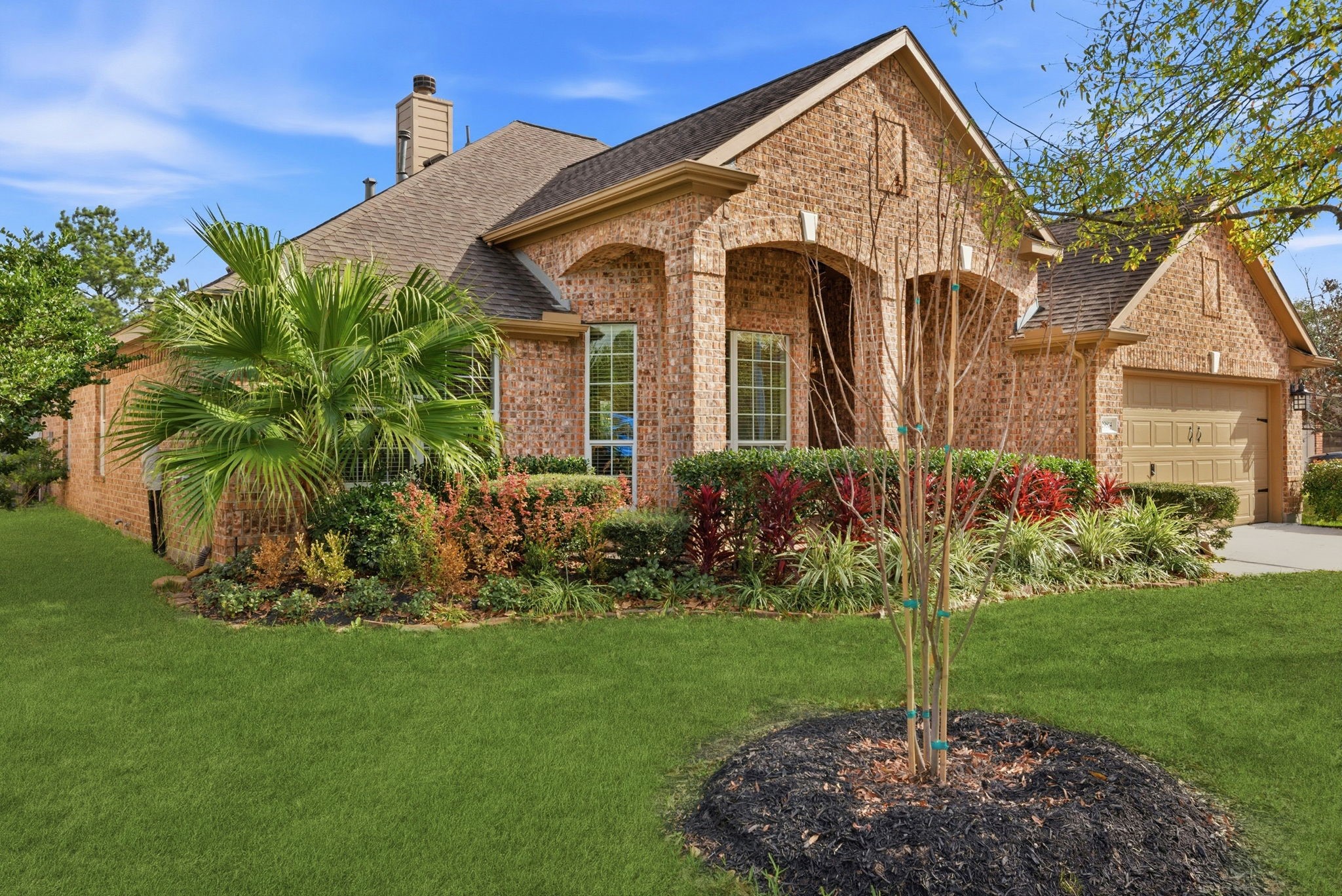 29814 Legends Pass Lane Spring, TX 77386 - Photo 2 of 46 a front view of a house with garden