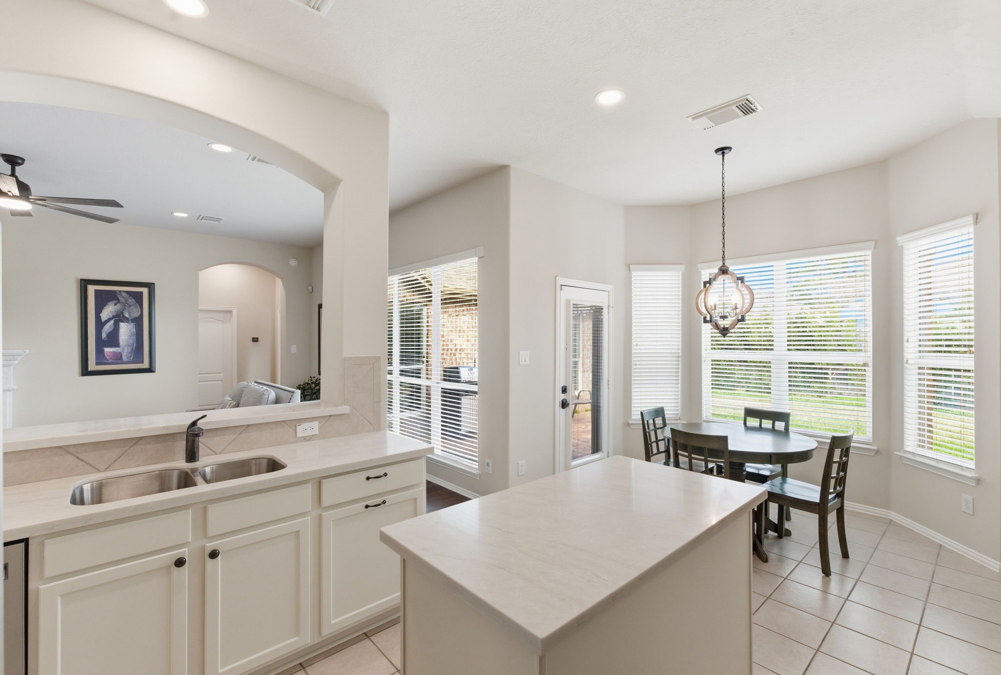 29814 Legends Pass Lane Spring, TX 77386 - Photo 26 of 46 a room with a table chairs and couches