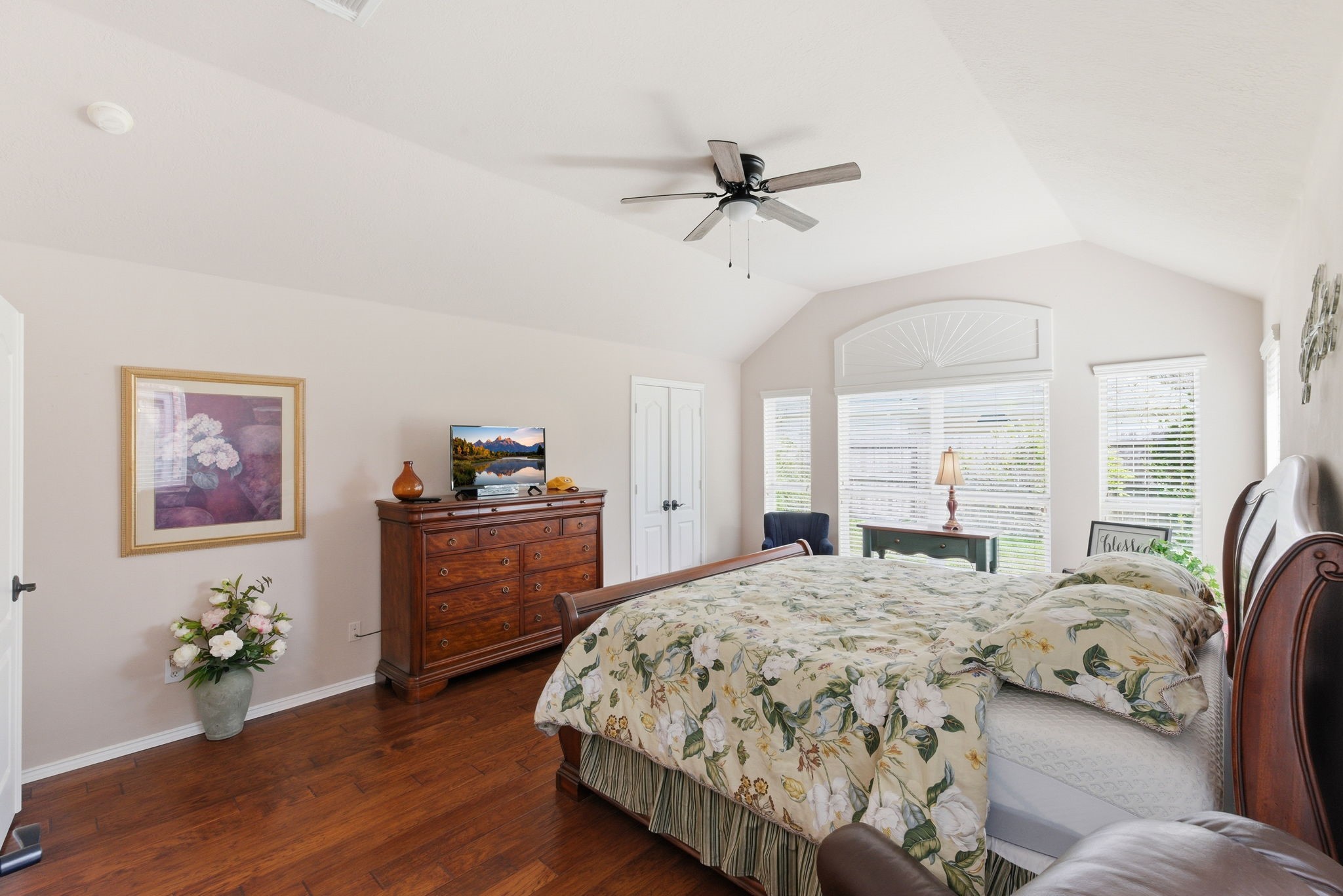 29814 Legends Pass Lane Spring, TX 77386 - Photo 32 of 46 a bedroom with a bed and wooden floor