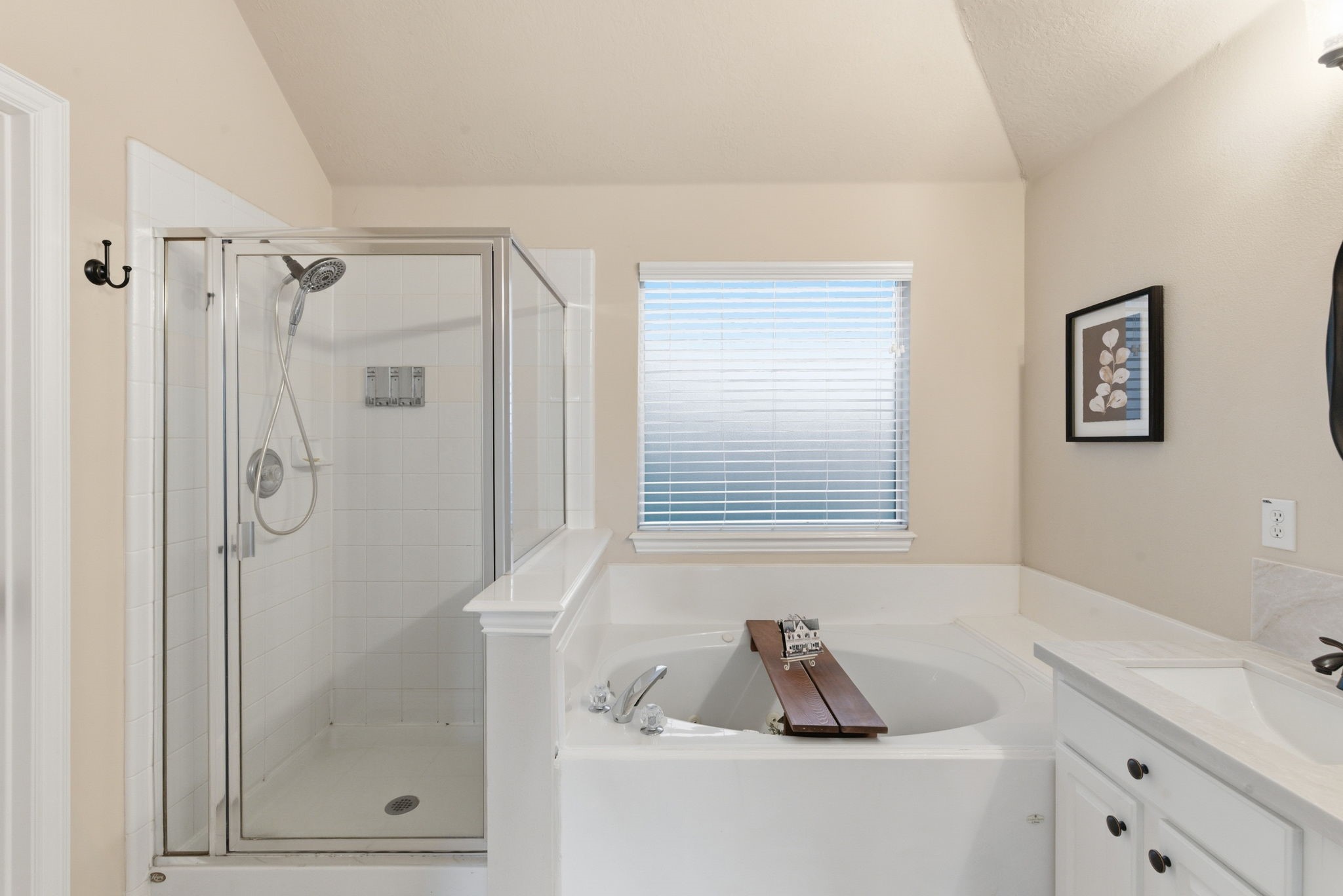 29814 Legends Pass Lane Spring, TX 77386 - Photo 35 of 46 a bathroom with a shower sink and vanity