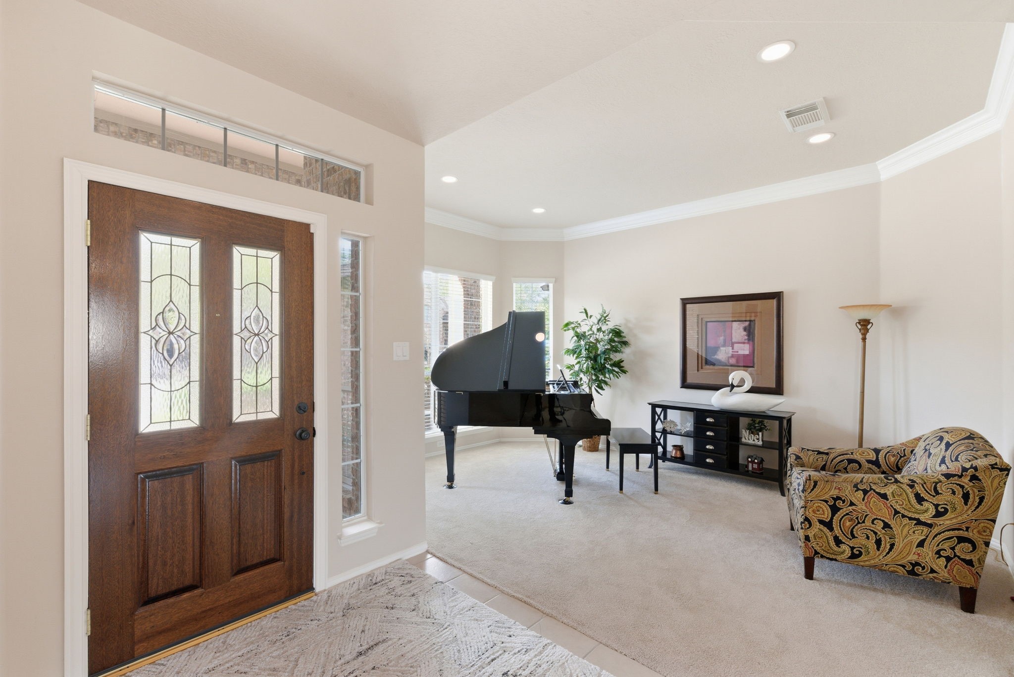 29814 Legends Pass Lane Spring, TX 77386 - Photo 10 of 46 a living room with furniture and a chandelier