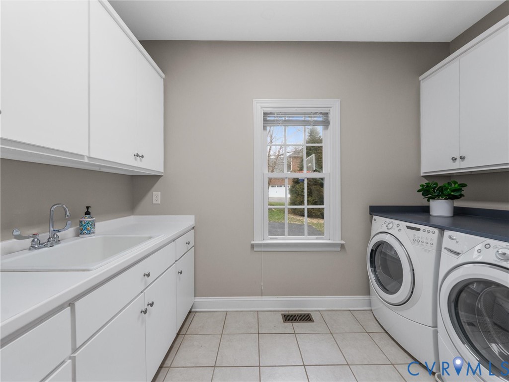 14335 Lander Road Midlothian, VA 23113 - Photo 26 of 70 Spacious bright laundry room with tile floor, clos