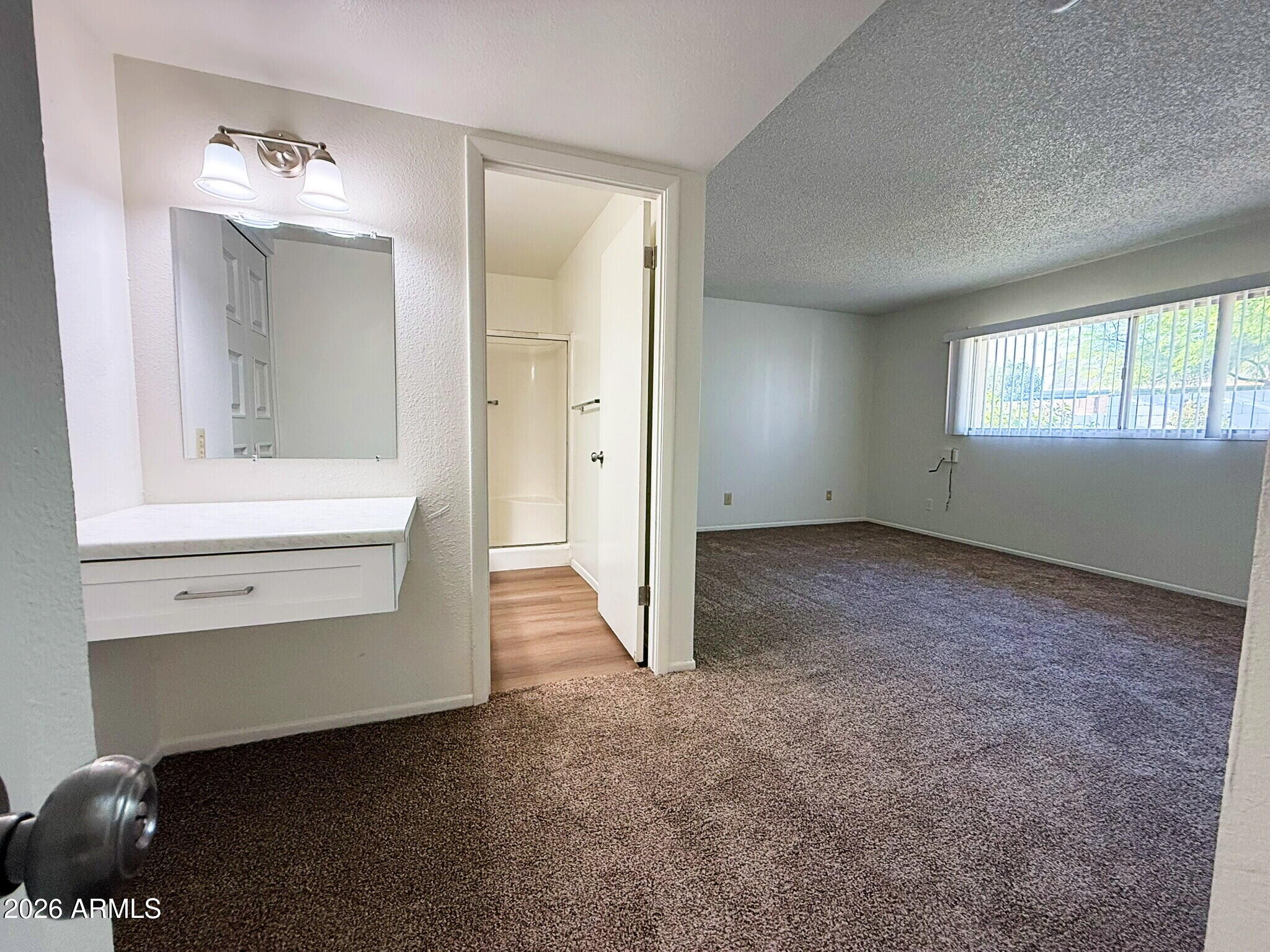 5208 West Calavar Road Glendale, AZ 85306 - Photo 9 of 39 wooden floor and window in a room