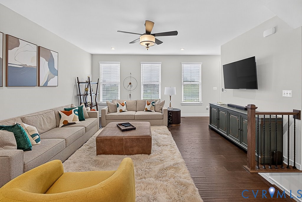 17976 Spotted Oak Road Dumfries, VA 22026 - Photo 16 of 52 Open-concept living space featuring wood-finish fl