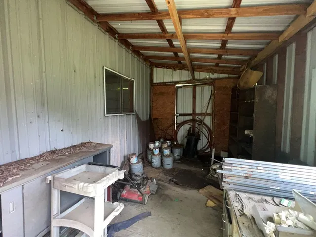 a view of a backyard with a house and garden