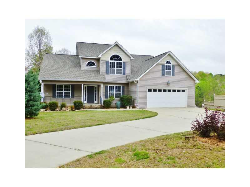 4876 Goddards Ford Road Gainesville, GA 30504 - Photo 1 of 1 Exterior Front. Welcome home: maintenance free vinyl siding, circular drive, rocking chair front porch.