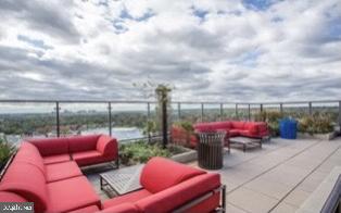 851 North Glebe Road, Unit 417 Arlington, VA 22203 - Photo 32 of 38 an outdoor sitting area with furniture and barbeque