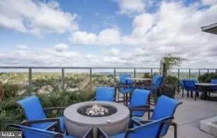 a view of a living room and kitchen