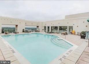 851 North Glebe Road, Unit 417 Arlington, VA 22203 - Photo 36 of 38 a view of a living room and kitchen