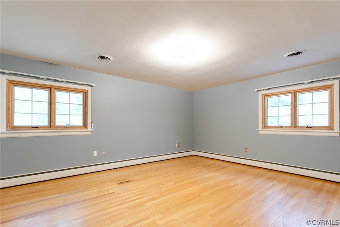 8946 Cherokee Road Richmond, VA 23235 - Photo 17 of 30 an empty room with a window