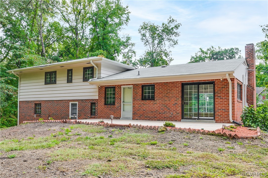 8946 Cherokee Road Richmond, VA 23235 - Photo 30 of 30 a front view of a house with garden