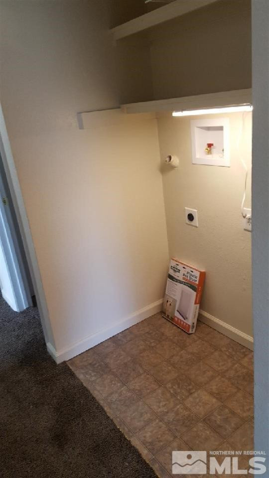126 E Street Hawthorne, NV 89415 - Photo 7 of 14 a room with a bench