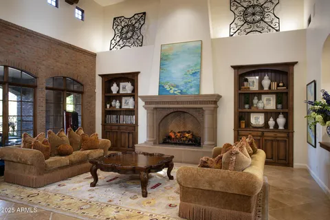 a kitchen with a table chairs and a stove