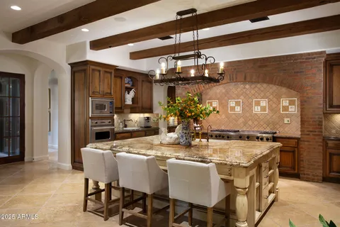 a living room with hard wood flooring