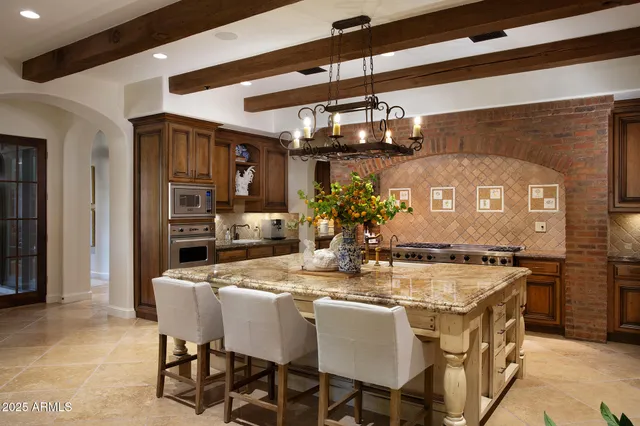 a living room with hard wood flooring