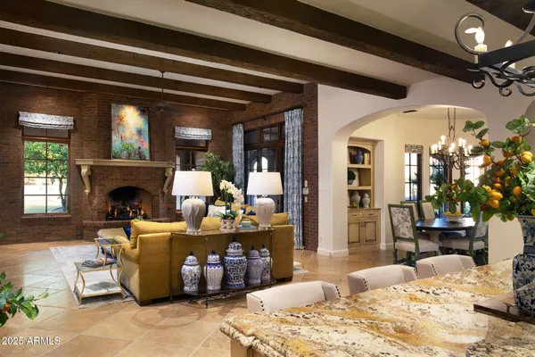a kitchen with a table chairs and a stove