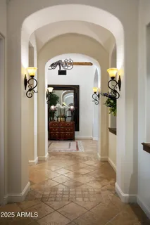 a bathroom with a sink vanity and mirror